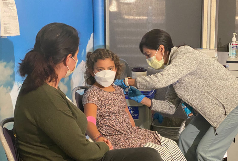 A child gets vaccinated