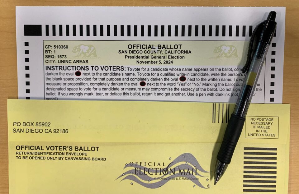 official ballot, ballot envelope and pen