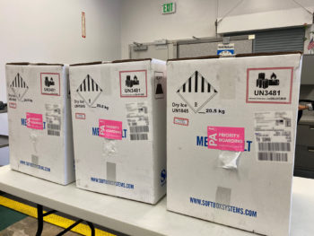 three boxes on a table