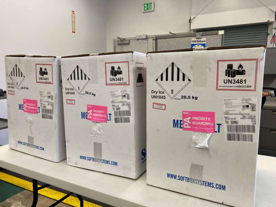 three boxes on a table