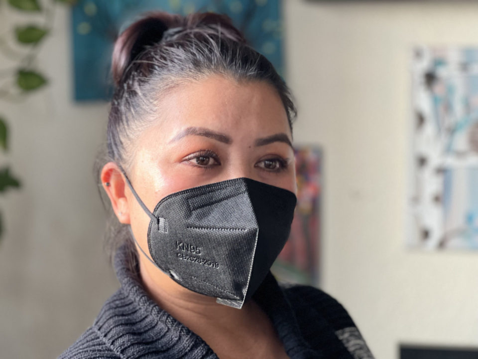woman wearing an N95 mask