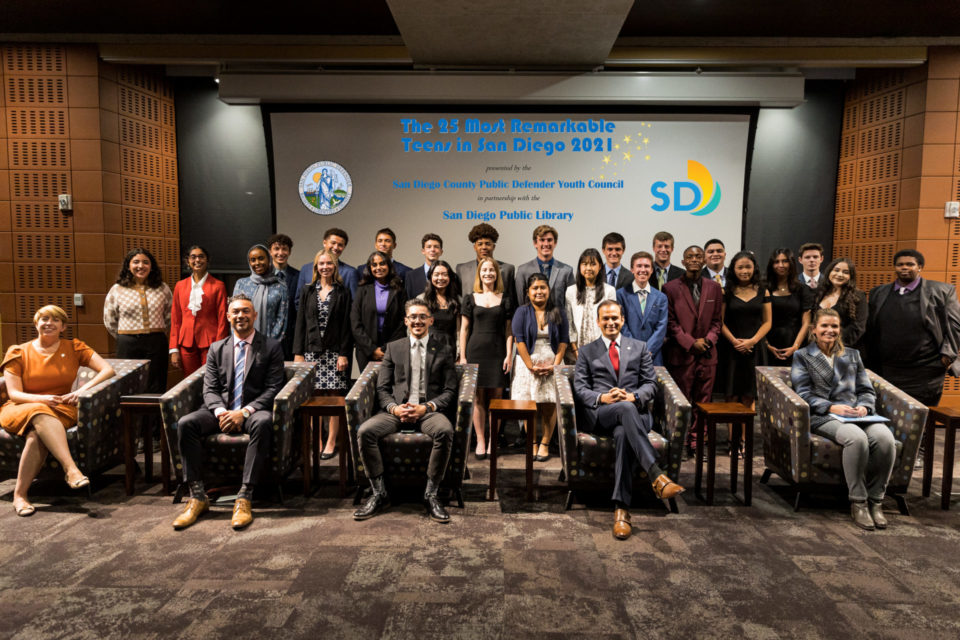 Group photo of 25 teens honored