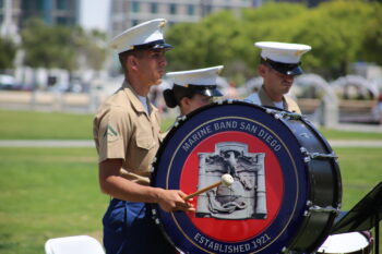 3 Marine Band San Diego members play drums
