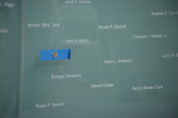 the names on the Law Enformement memorial with one piece of blue tape over an empty space