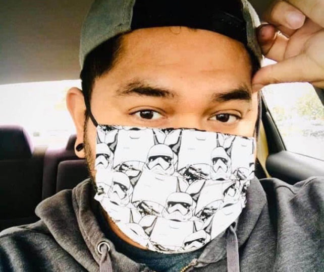man wearing a face covering