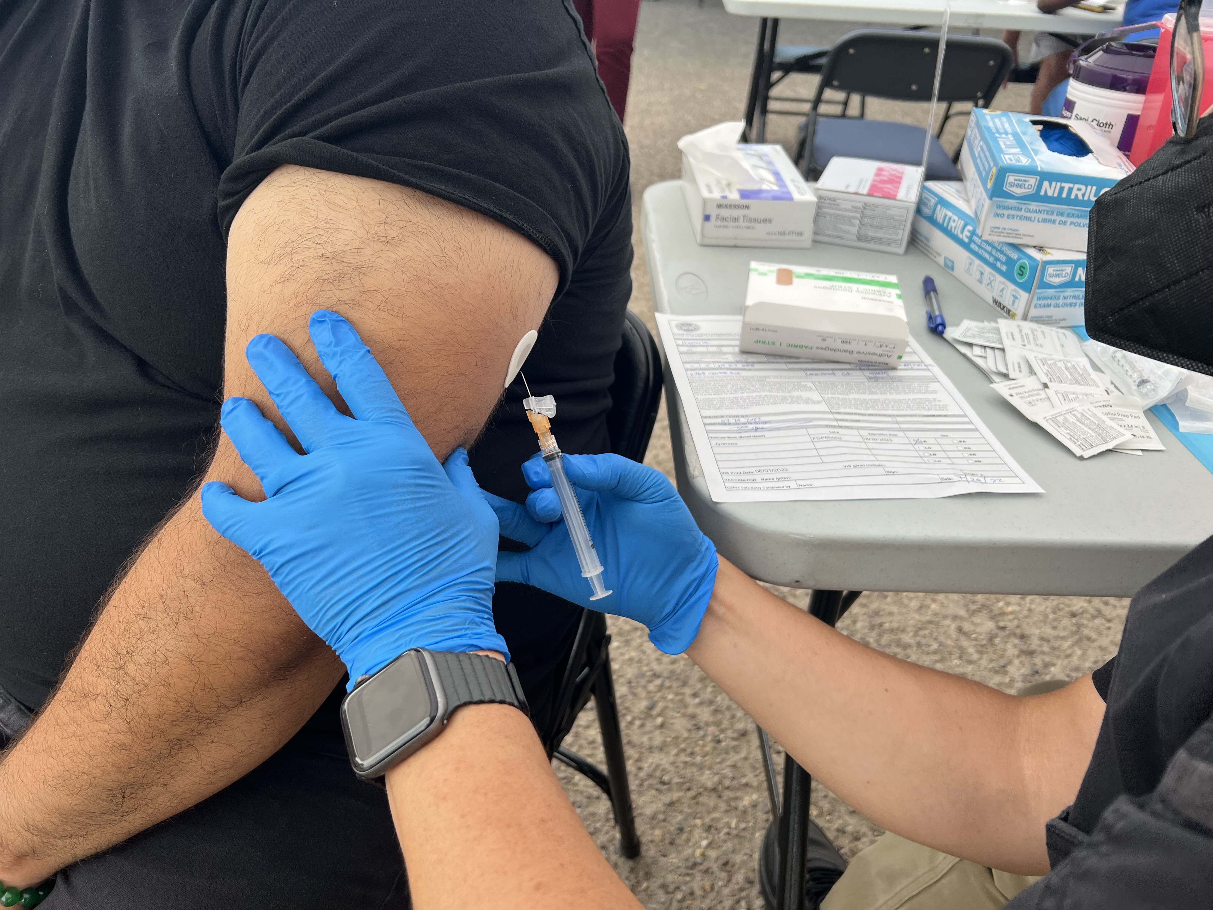 an image of a man getting a monkeypox vaccine