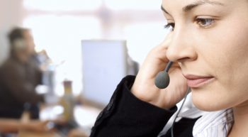 woman speaking on a phone headset