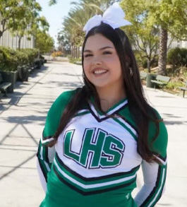 Teen in cheer uniform