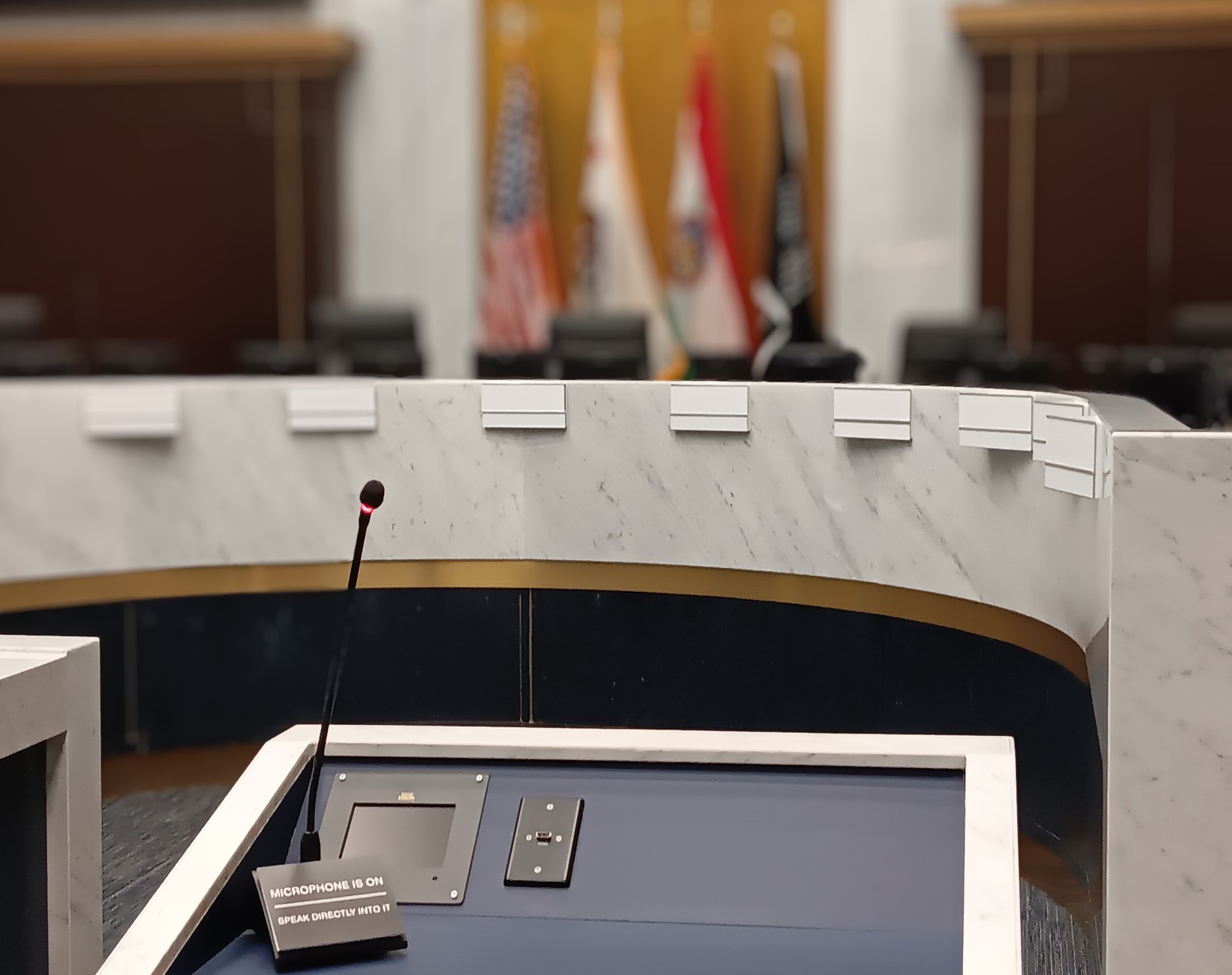 view from the speakers podium looking towards the dias in the chambers