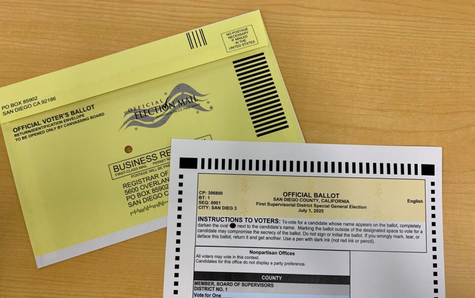 official ballot and envelope on a table