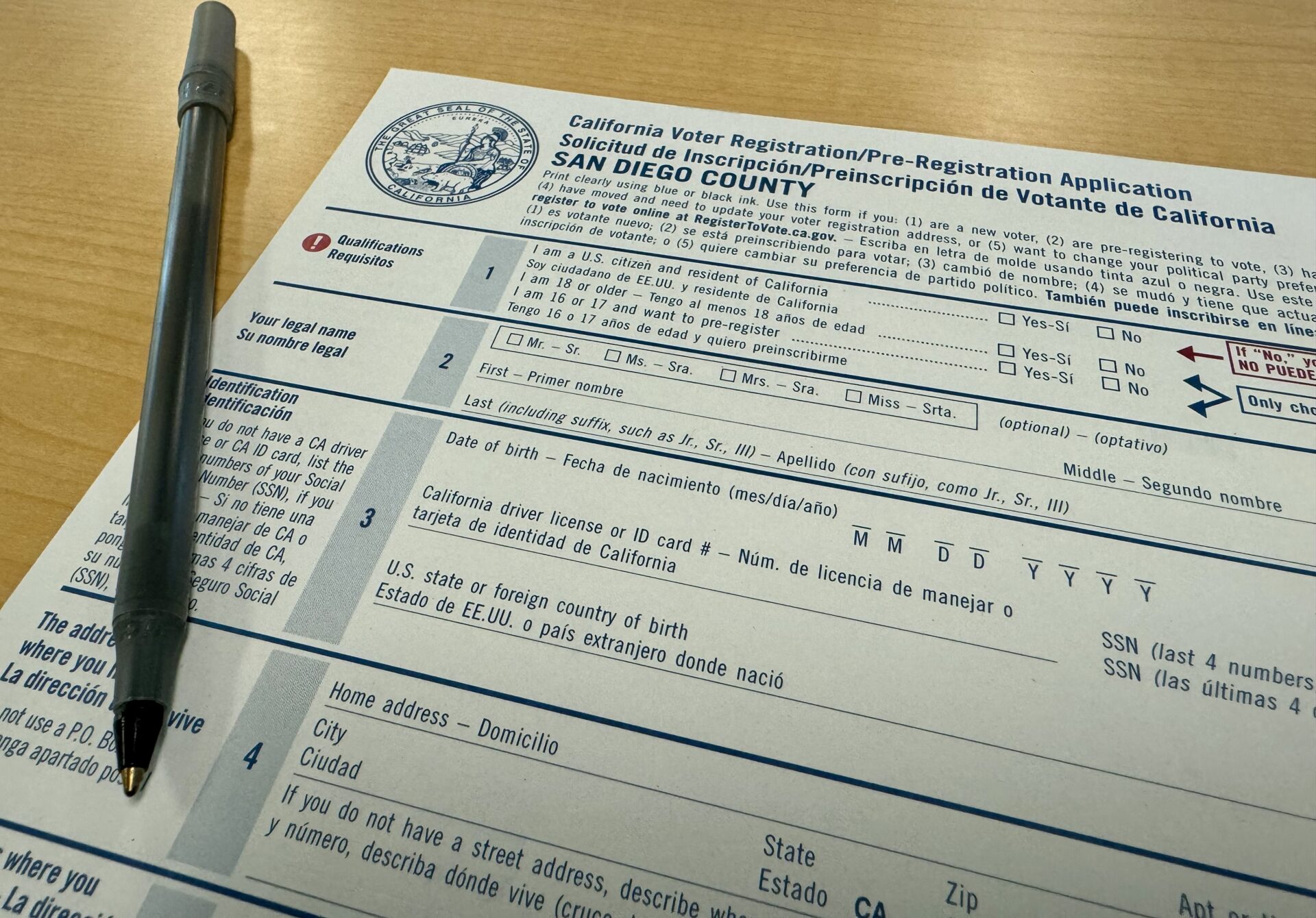 Pen and voter registration form.