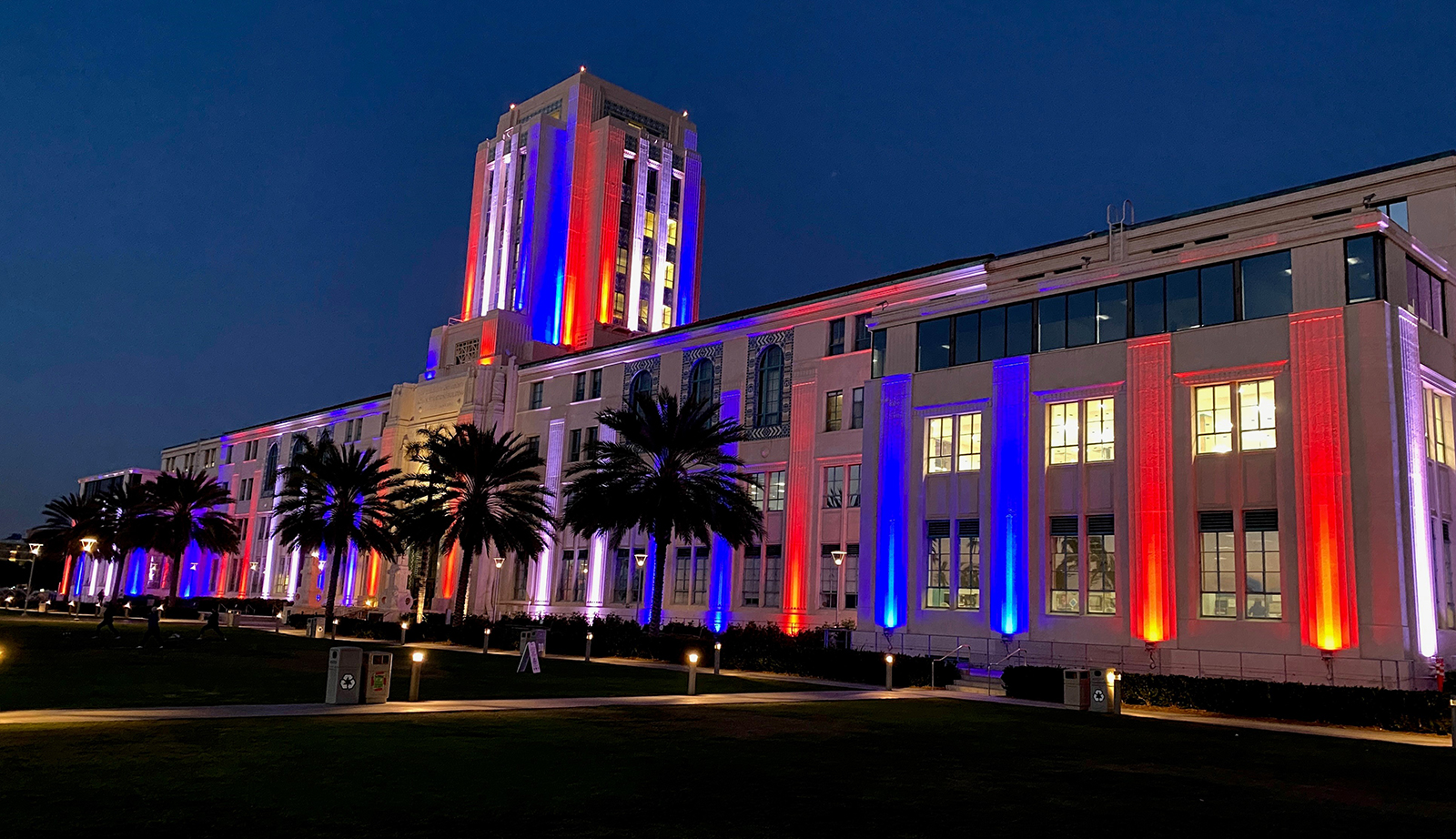 The County Administration Center is lit up in red, white and blue.