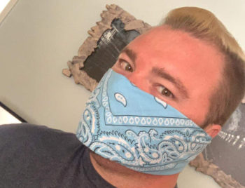 man wearing face covering