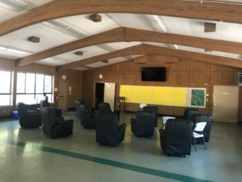 room inside a building with recliner chairs at new Fox Fire Center