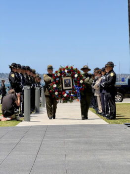 Officers carry wreath for fallen Officer Craven
