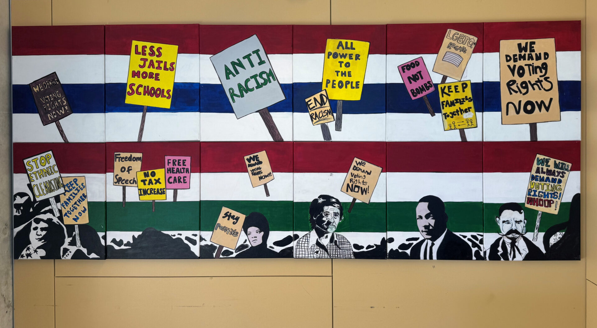 a collage of civil rights leaders hanging on a wall