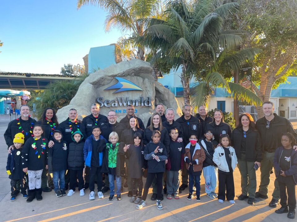 DA's office with kids at Shop with a Cop at Sea World.