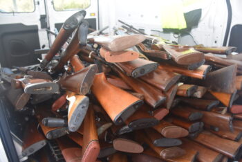 a pile of guns