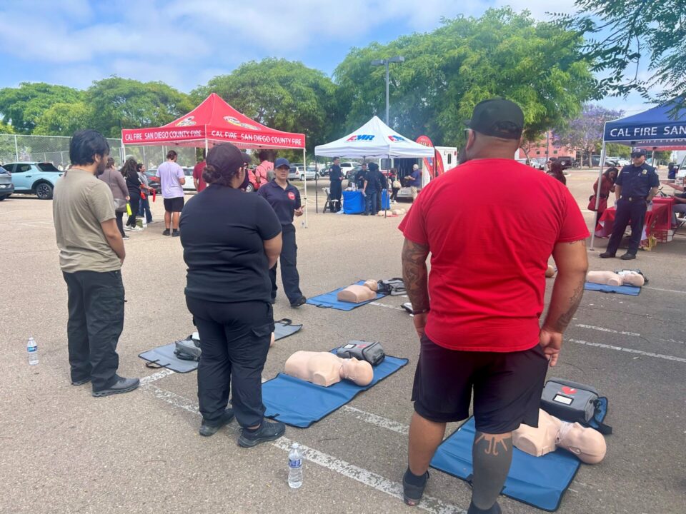 Emergency Medical Services instructor teaches basic CPR.