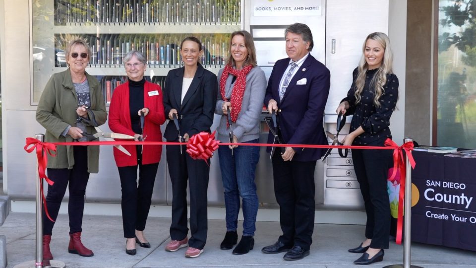 officials cutting a ribbon