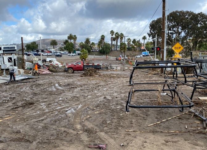 debris on a road after a flood