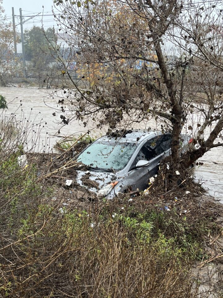Car stuck in flooding.