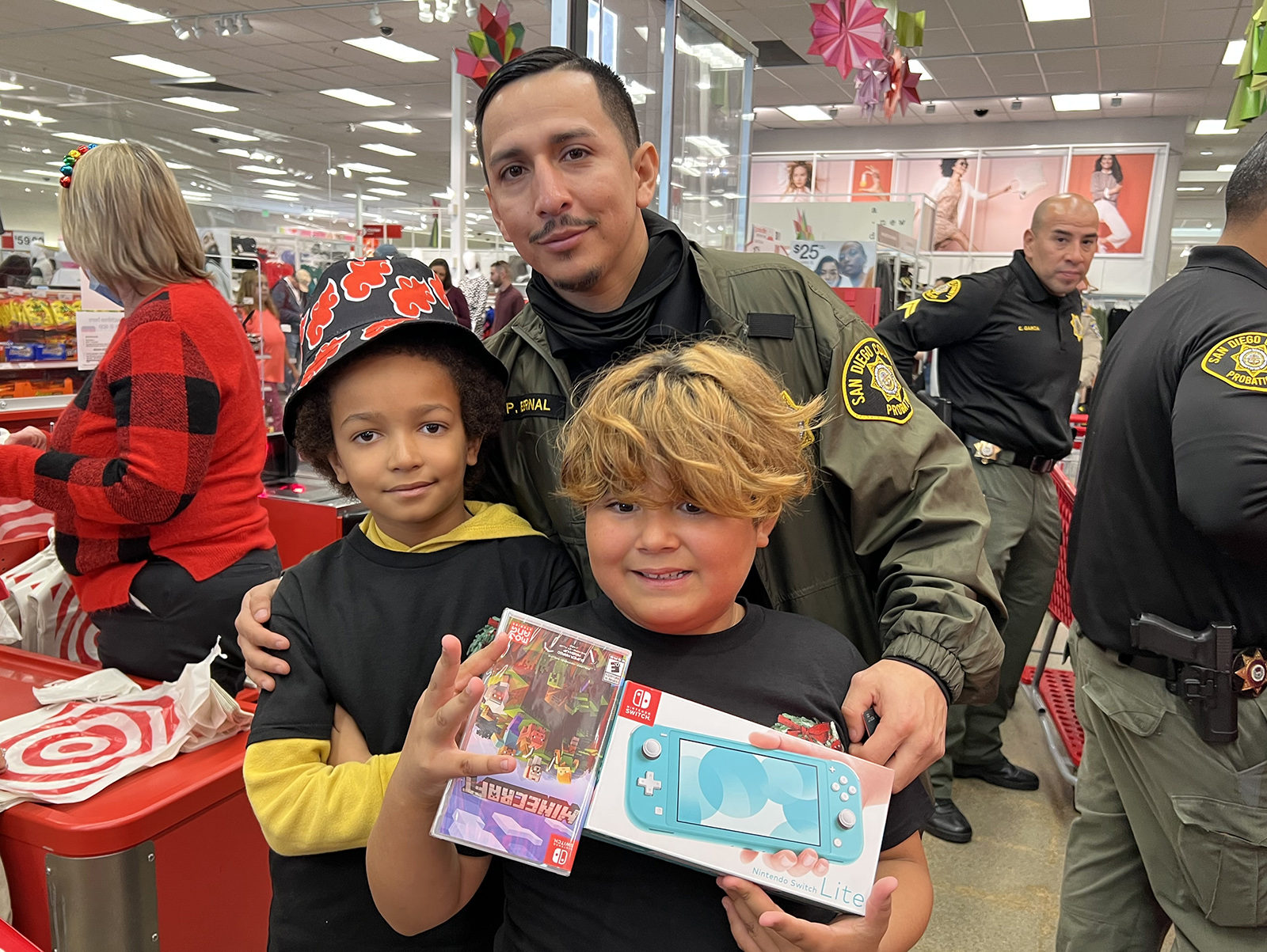 Probation Officer and two children shopping