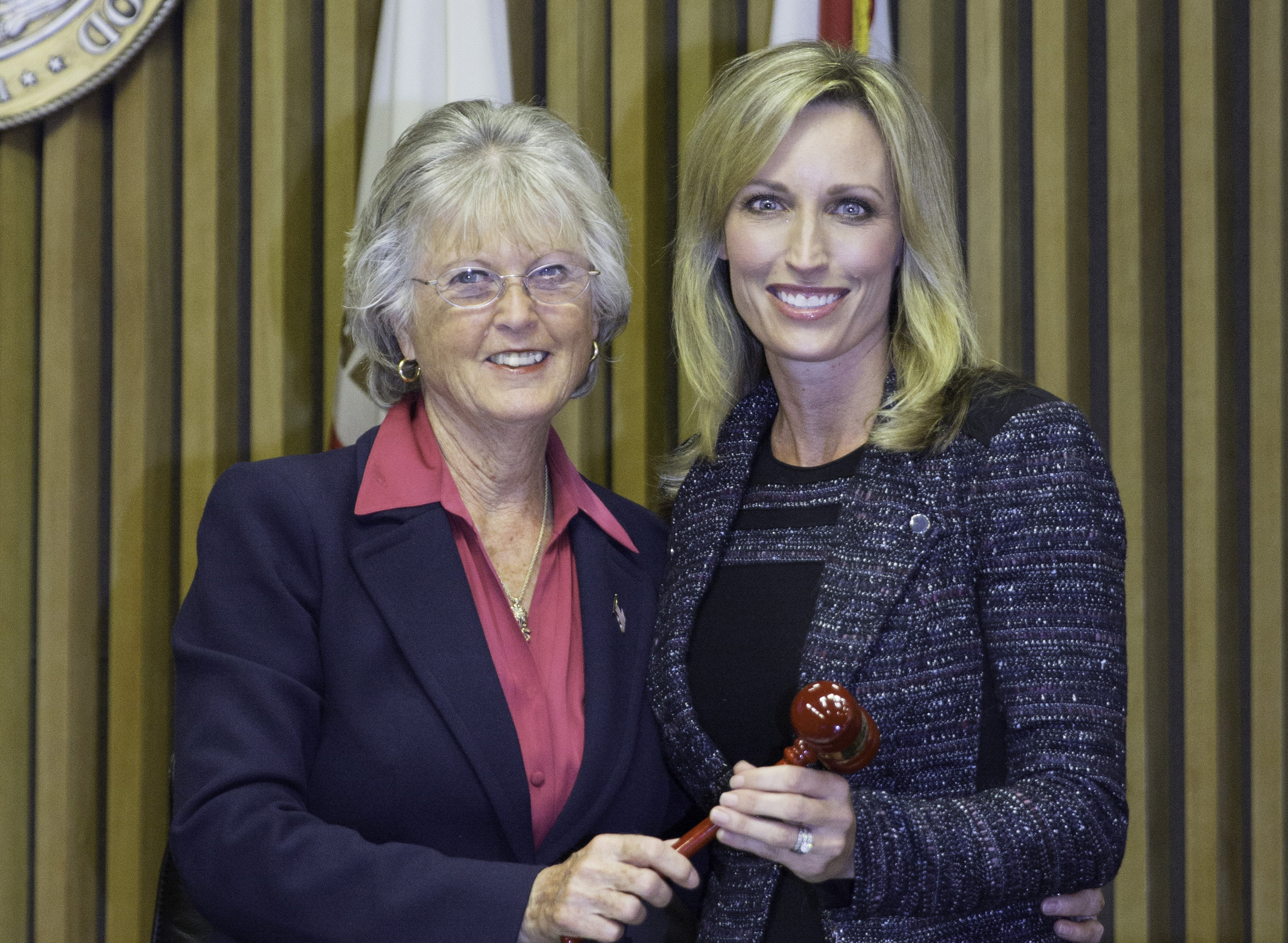 Dianne Jacob passes the gavel to Kristin Gaspar