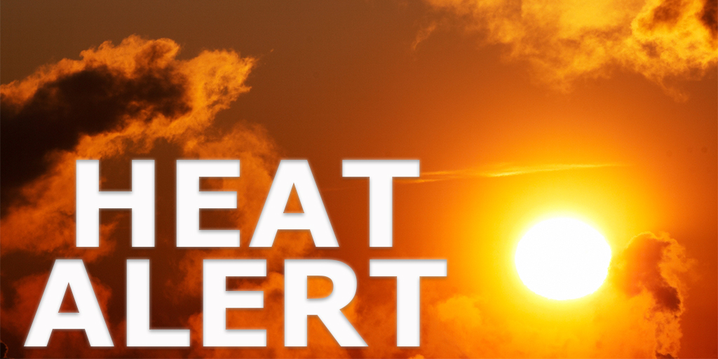 Heat Alert text written over orange sky