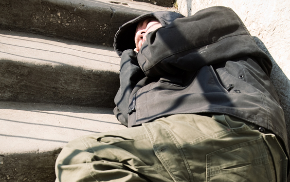 man sleeping on the street
