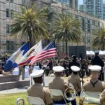 Military band sitting outside County Administration Center