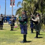 Bagpipers and drummers play near the Law Enforcement Memorial