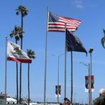 Several flags displayed in Waterfront Park