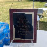 Award plaque on stand near the Law Enforcement Memorial