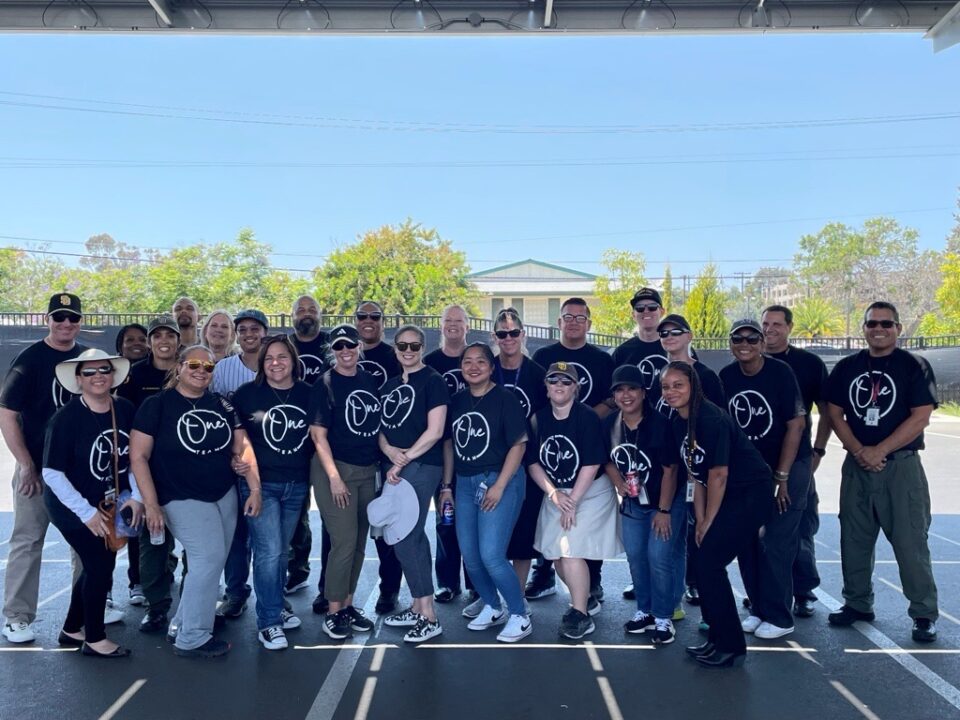 group of people in parking lot