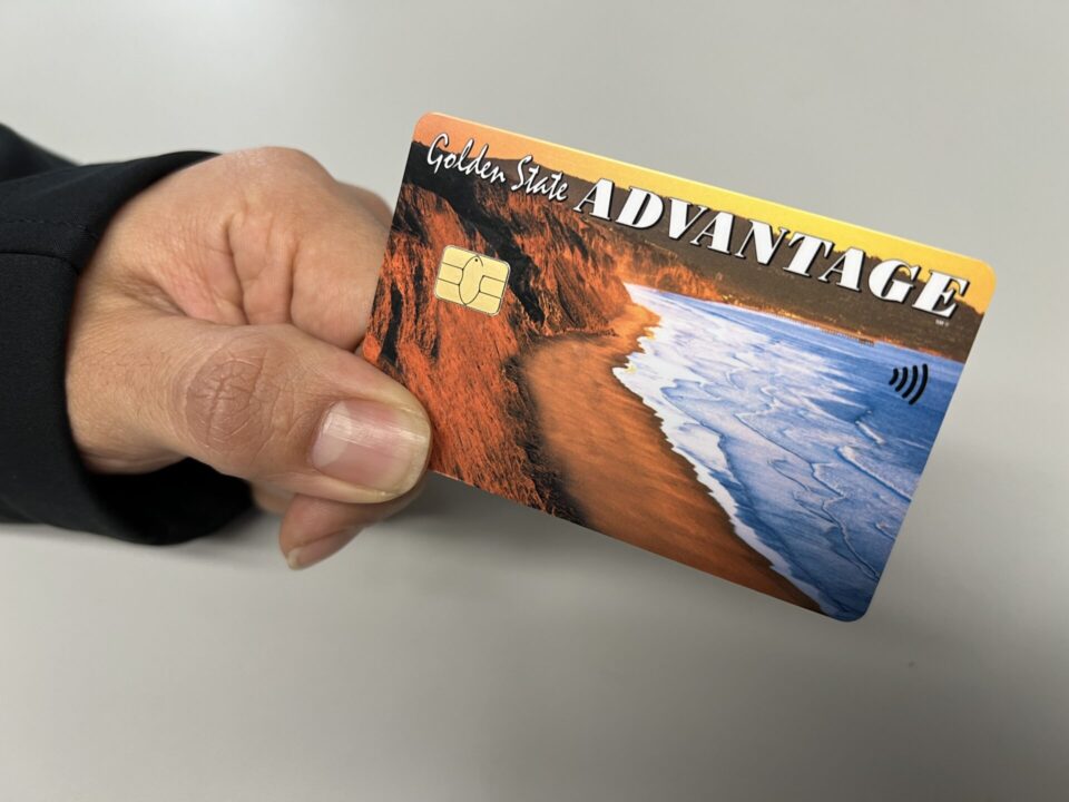 EBT chip card held by male hand