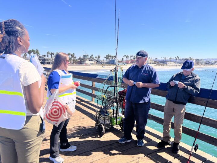 CDC staff talk to people in Imperial beach about ACE Survey