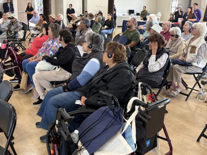 Seniors listening to a presentation
