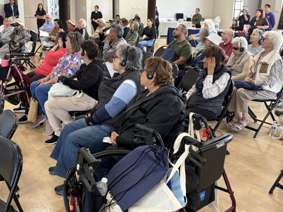 Seniors listening to a presentation