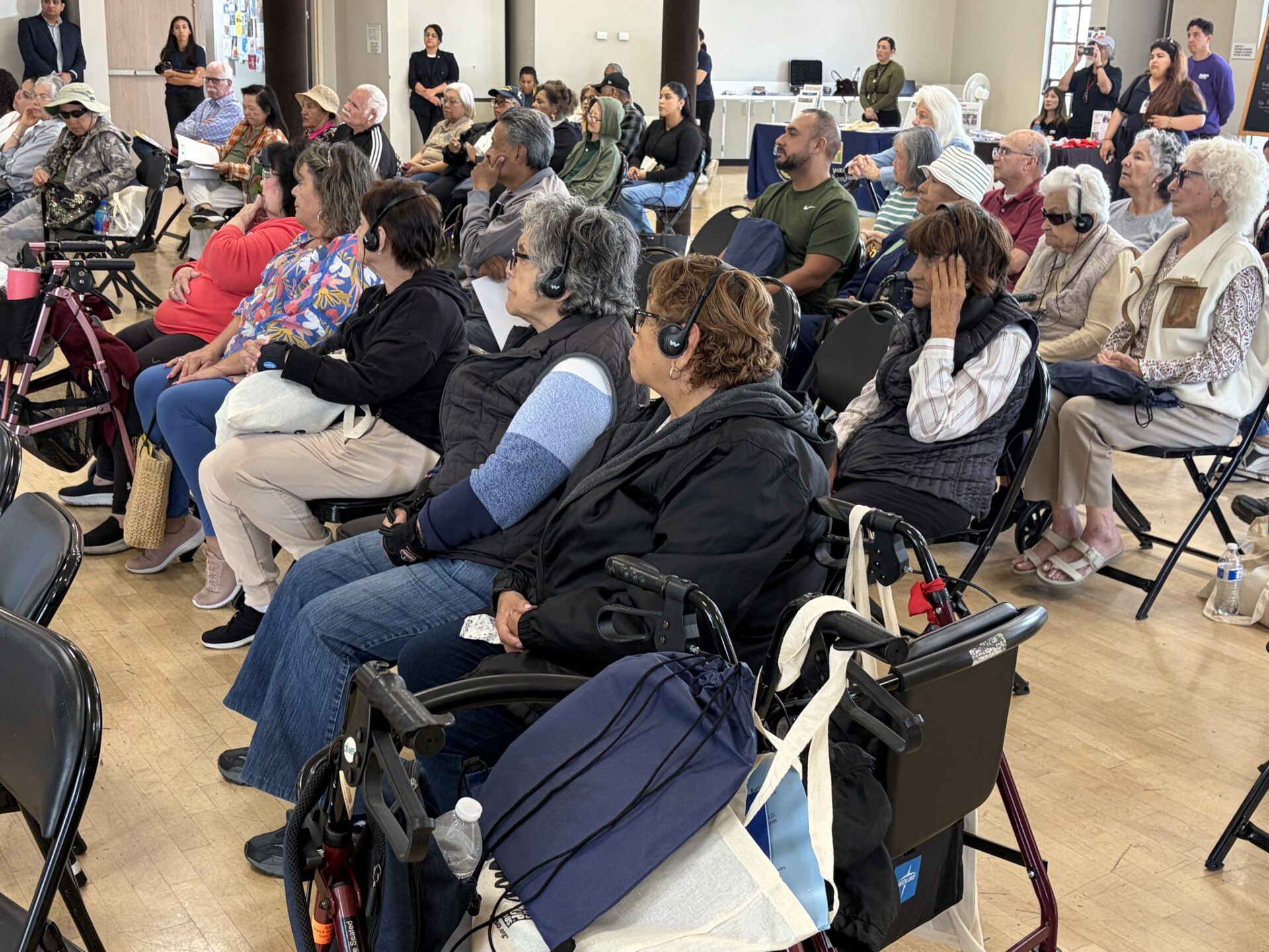 Seniors listening to a presentation