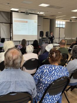 Older adults facing screen for presentation