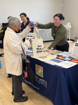 Senior receives bag with safety information