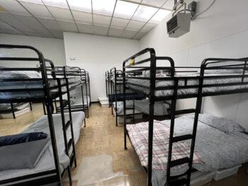 several bunkbeds in a room