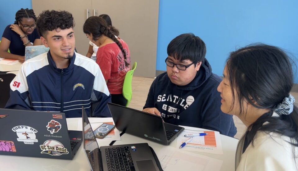 Students work on laptops at public health advocates camp