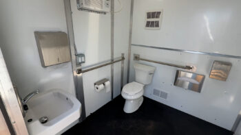 inside bathroom with sink and toilet