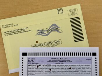 Mail ballot and yellow mail ballot envelope