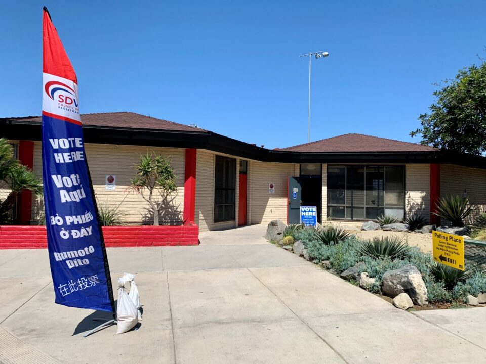 North Park Rec Center with "vote here" flag outside