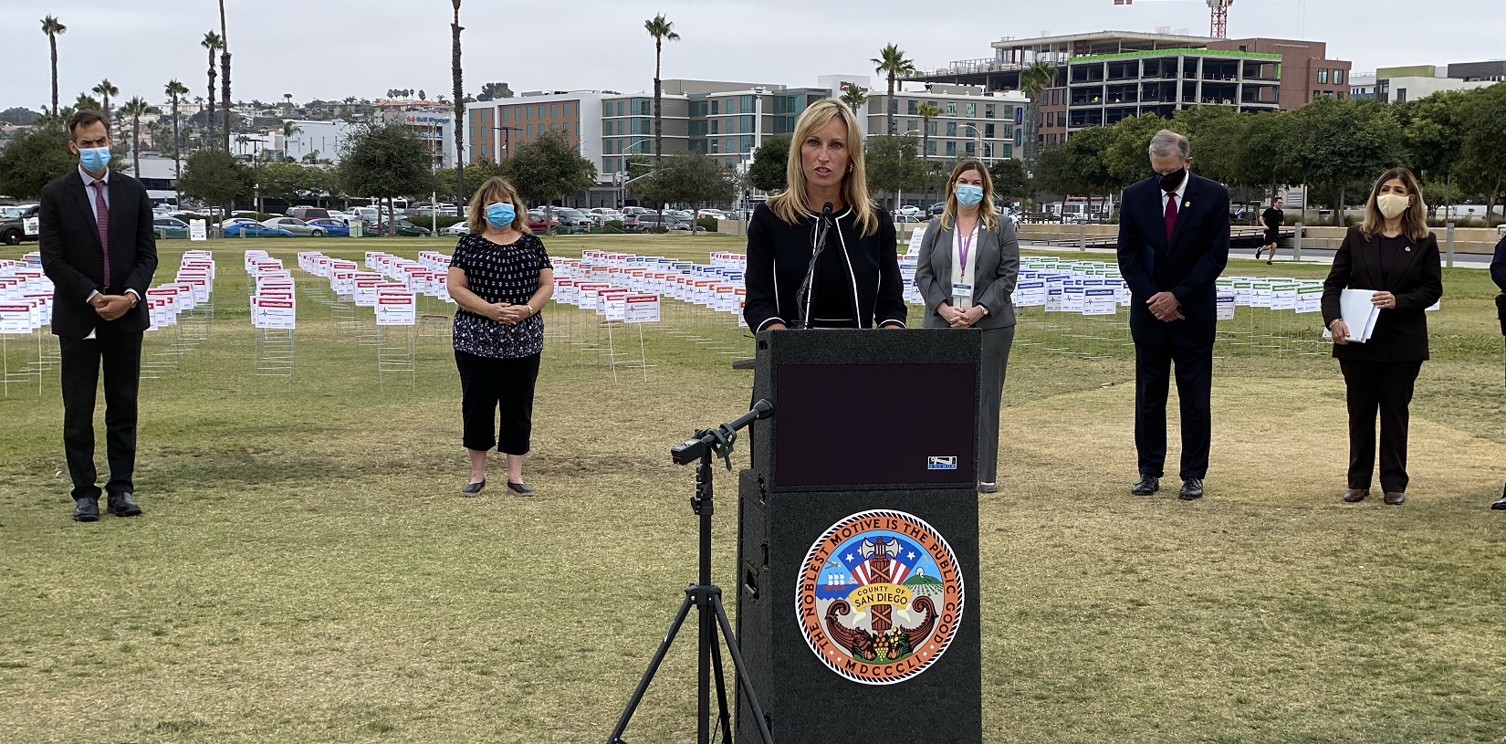Supervisor Kristin Gaspar standing at a podium.