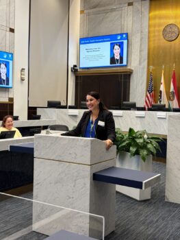 Dr. Hernandez at podium speaking