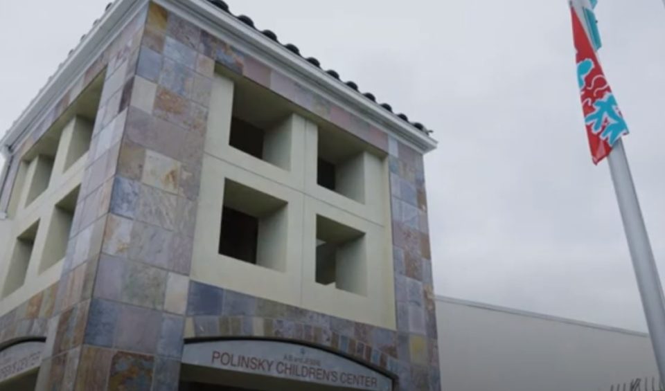 Building with flag pole and flag